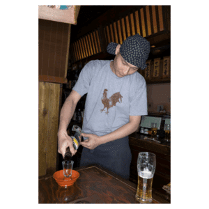 man pouring sake