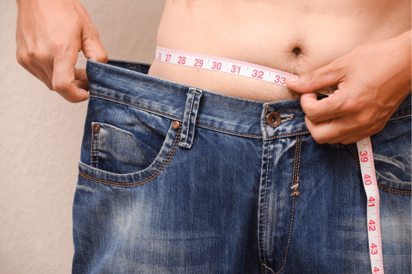 Measuring waistline to track progress with weight loss over 40