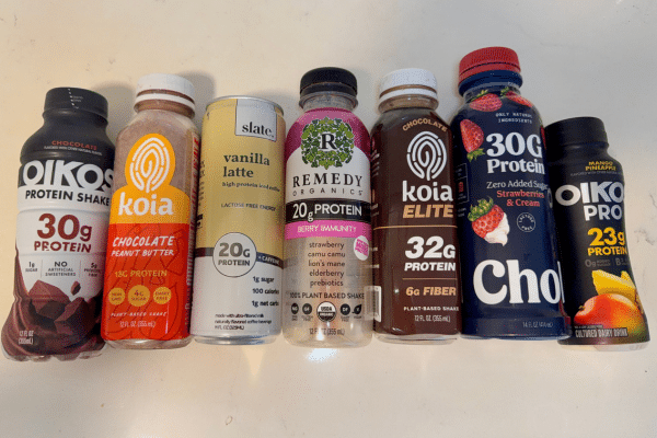 Ready to drink protein shakes including Oikos, Koia, Slate, Remedy, and Chobani lined up for comparison